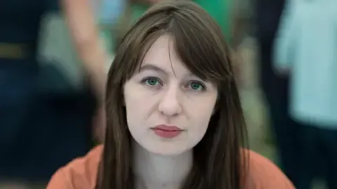 Irish author Sally Rooney states she is unable to visit the UK because of arrest fears
